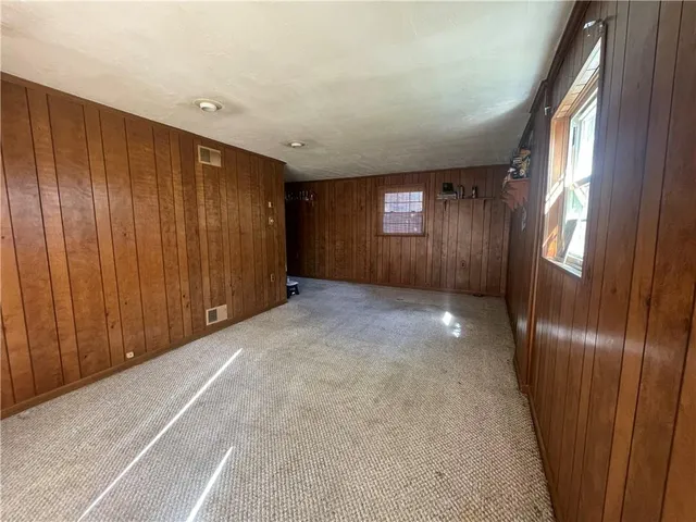 en empty room with windows