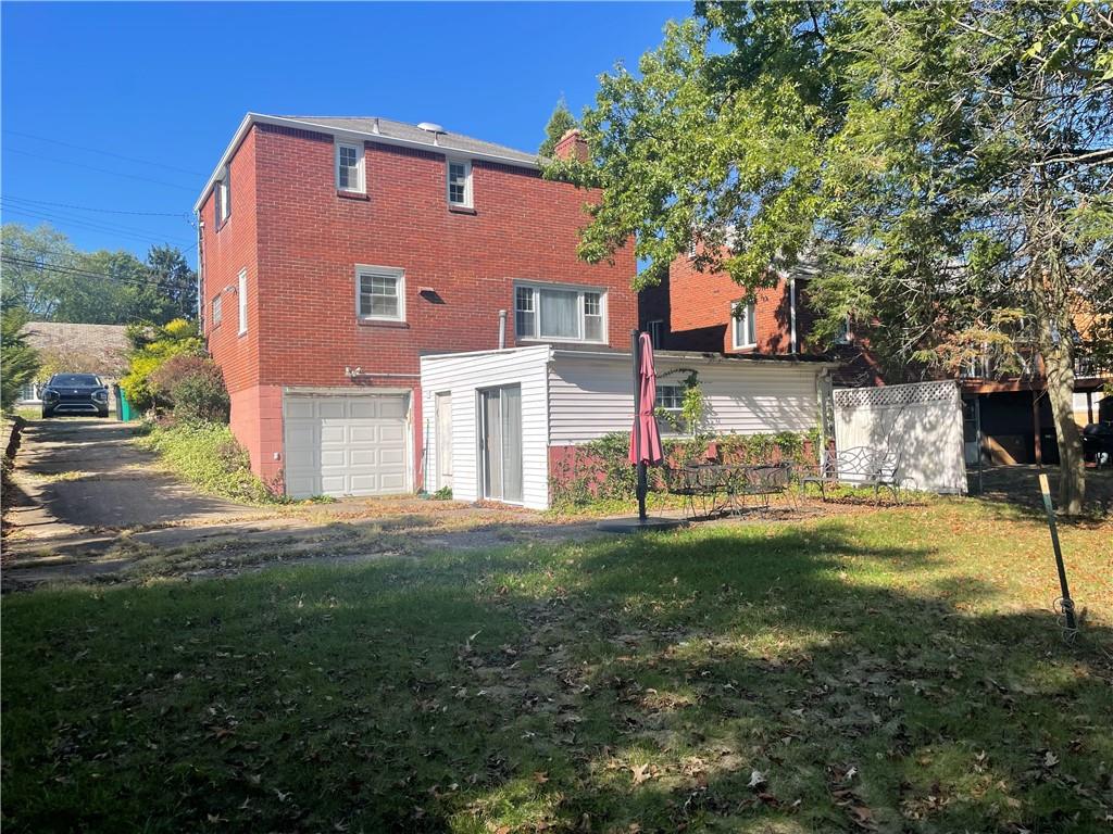 1018 Grandview Avenue Pittsburgh, PA 15237 - Photo 22 of 29 a front view of a house with a yard