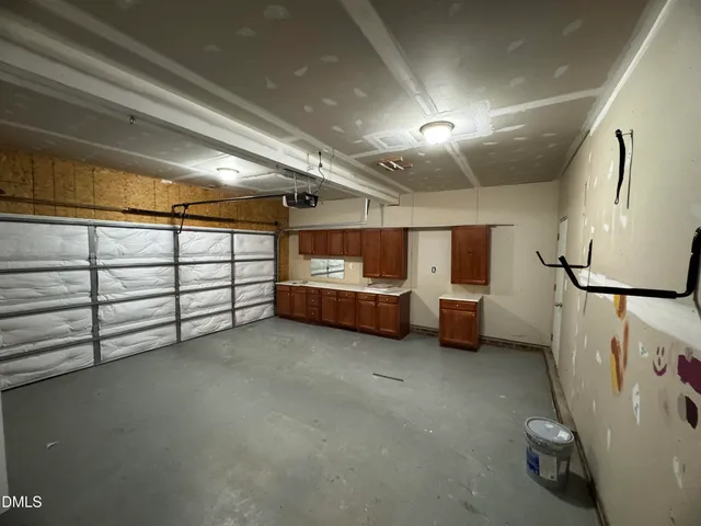 a swimming pool with wooden fence