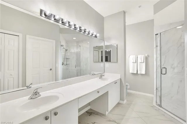 a bedroom with a bed dresser and a window