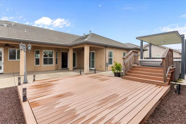 a view of balcony with furniture