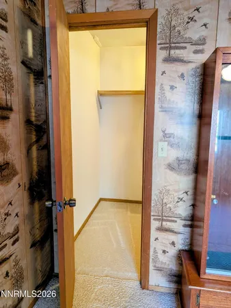 a kitchen with a sink a stove and cabinets