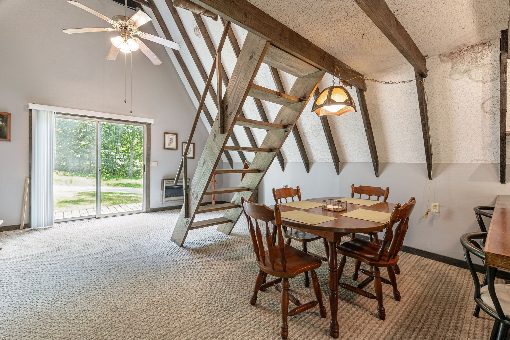 111 Mud Hill Road Dover, TN 37058 - Photo 11 of 62 a dining room with furniture and a floor to ceiling window
