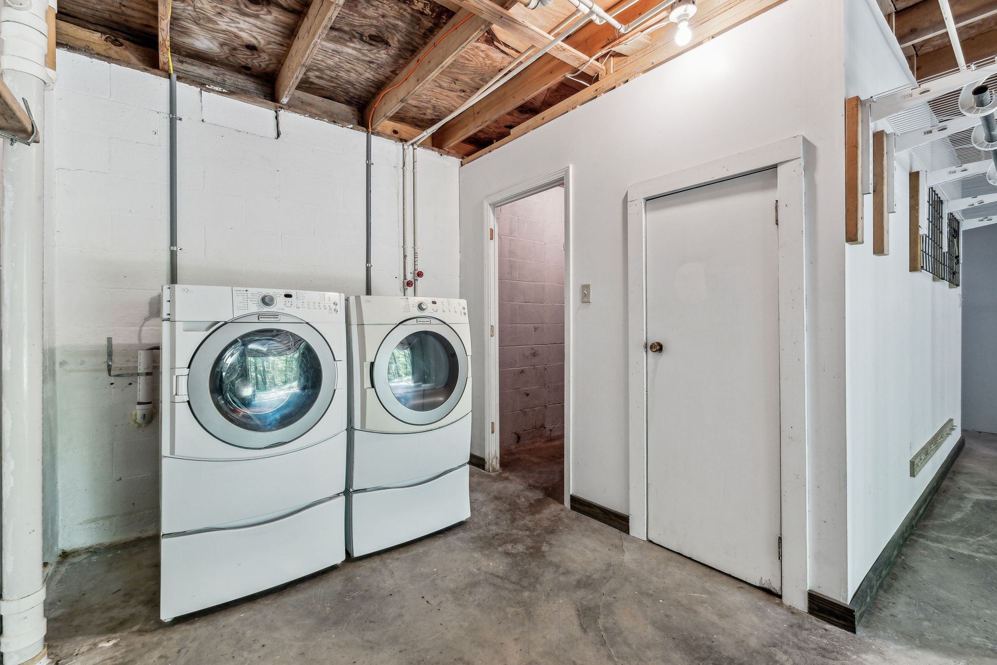 111 Mud Hill Road Dover, TN 37058 - Photo 28 of 62 a utility room with dryer and washer