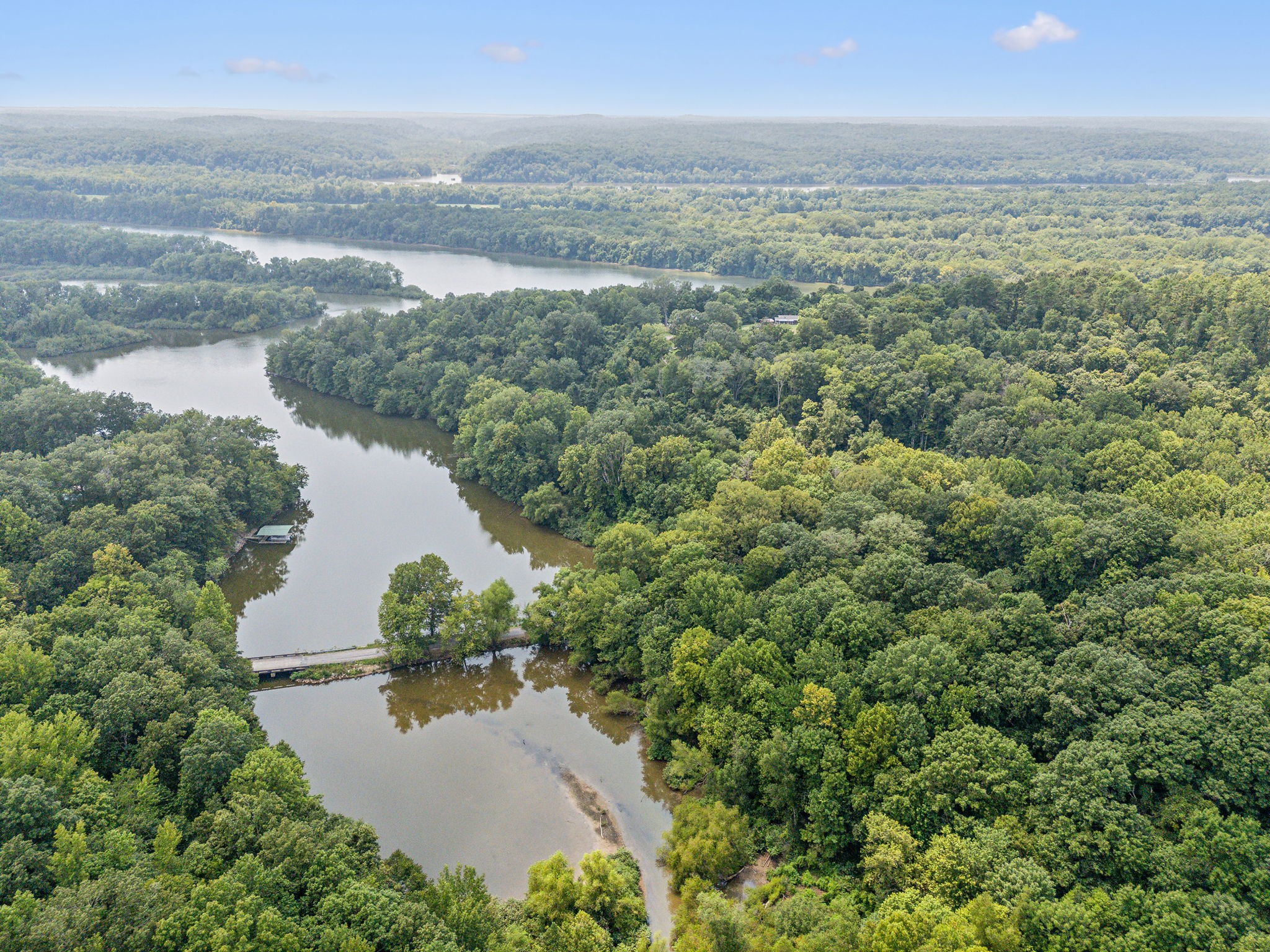 111 Mud Hill Road Dover, TN 37058 - Photo 49 of 62 an aerial view of residential houses with outdoor space and trees