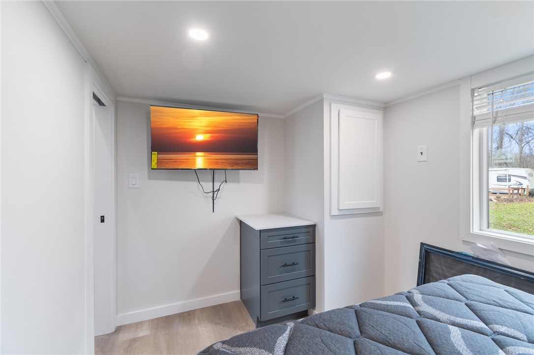 7150 Garner Road, Unit 4 Huron, NY 14590 - Photo 13 of 22 There’s even a FLAT SCREEN!