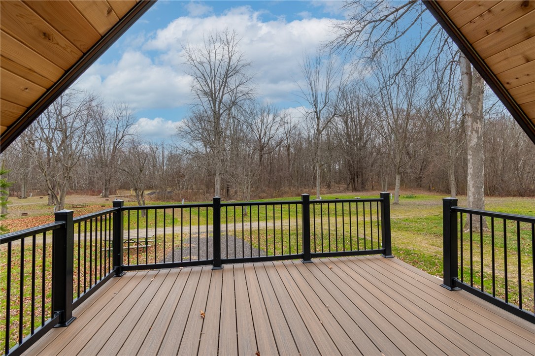 7150 Garner Road, Unit 4 Huron, NY 14590 - Photo 7 of 22 Enjoy the relaxing views from the covered porch!