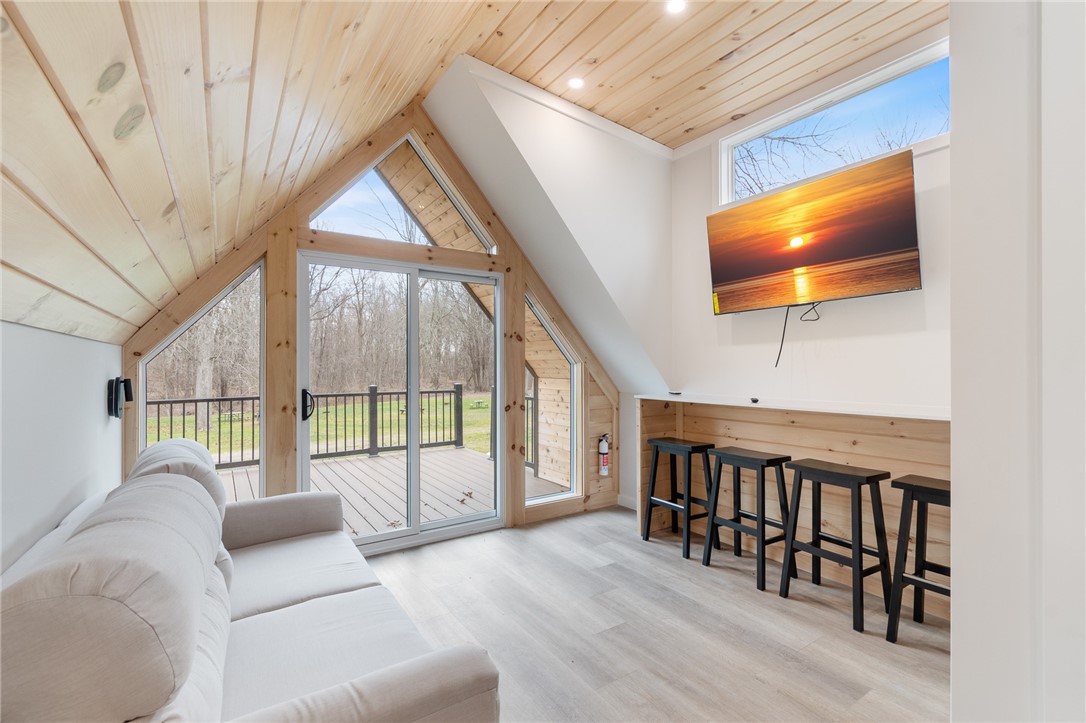 7150 Garner Road, Unit 4 Huron, NY 14590 - Photo 8 of 22 The vaulted ceiling gives this space that “roomy”