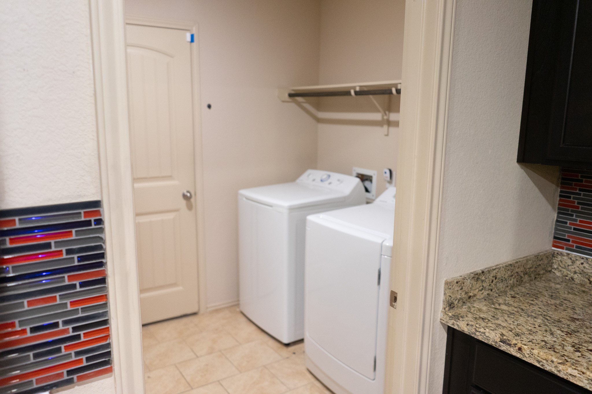 23318 Sawmill Pass Spring, TX 77373 - Photo 8 of 31 Utility room from kitchen towards garage.