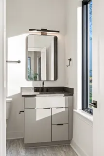 a view of a hallway with white walls