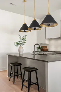 a view of living room filled with furniture and window