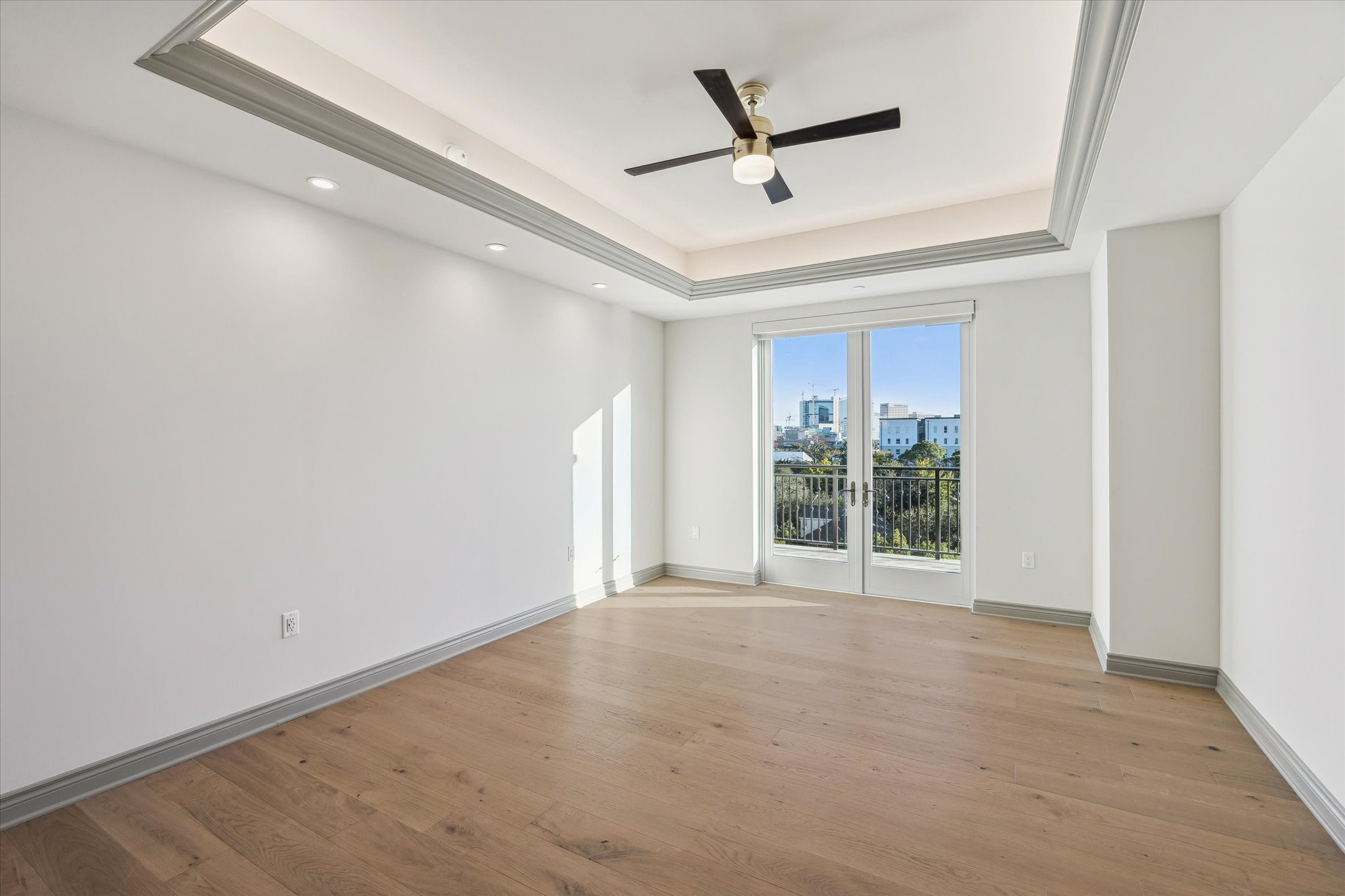 1717 Bissonnet Street, Unit 1604 Houston, TX 77005 - Photo 13 of 32 Primary suite with French doors leading to an extended 5th floor terrace overlooking the pool area.