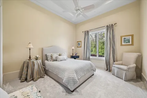 a living room with furniture and white walls