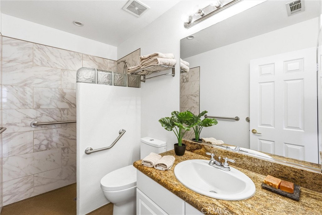 8336 Barnwood Lane Riverside, CA 92508 - Photo 16 of 44 Accessible bathroom with specialized flooring