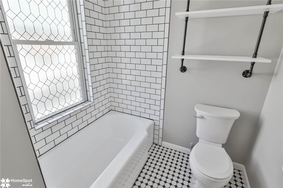 619 Sioux Street Bethlehem, PA 18015 - Photo 33 of 61 a bathroom with a bathtub and toilet