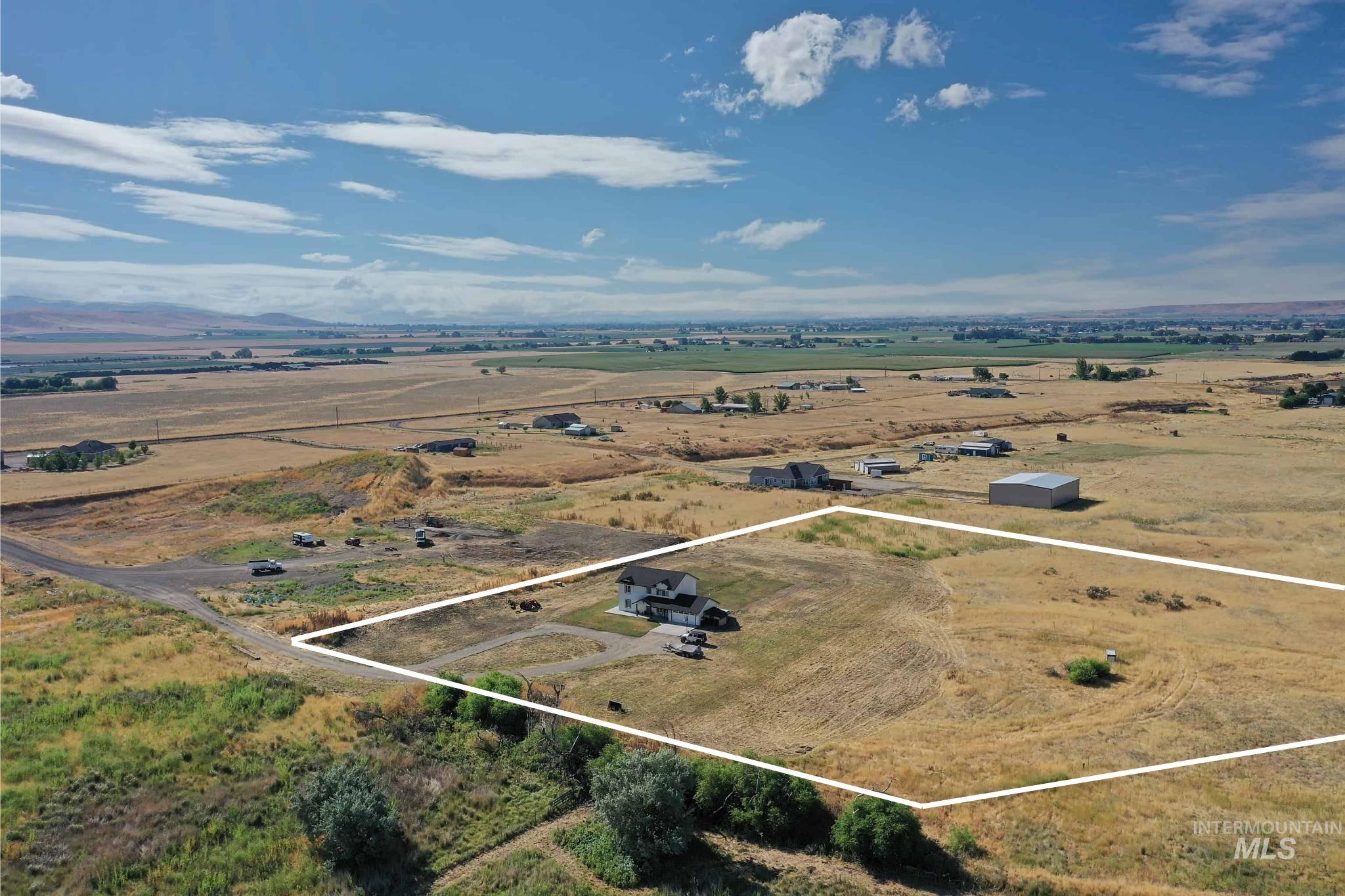 1049 Price Road Weiser, ID 83672 - Photo 40 of 47 Expansive rural property featuring a single-family residence, substantial open land, and partial mountain scenery