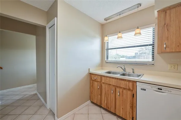 $1,650 | 11001 Southeast Sunset Harbor Road, Unit H52, Summerfield, FL 34491