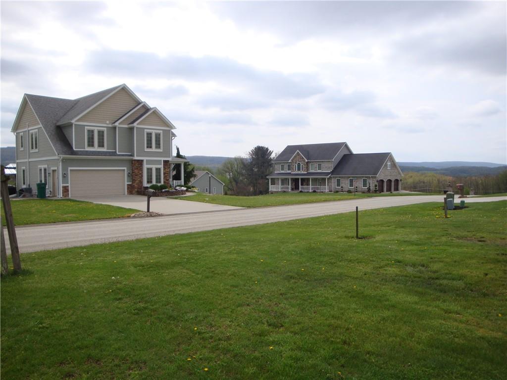 729 Victoria Way Derry, PA 15627 - Photo 2 of 3 a front view of a house with a yard