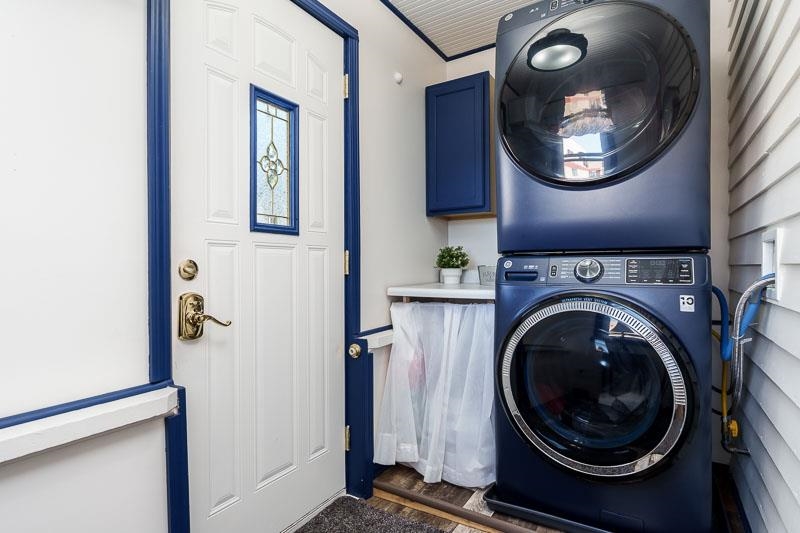 620 Harlem Road Machesney Park, IL 61115 - Photo 14 of 42 a view of a hallway with washer and dryer