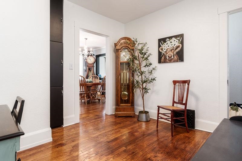 620 Harlem Road Machesney Park, IL 61115 - Photo 16 of 42 a view of a livingroom with furniture and wooden floor
