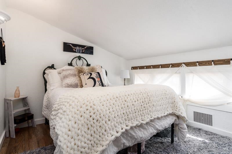 620 Harlem Road Machesney Park, IL 61115 - Photo 24 of 42 a bedroom with a bed and a window