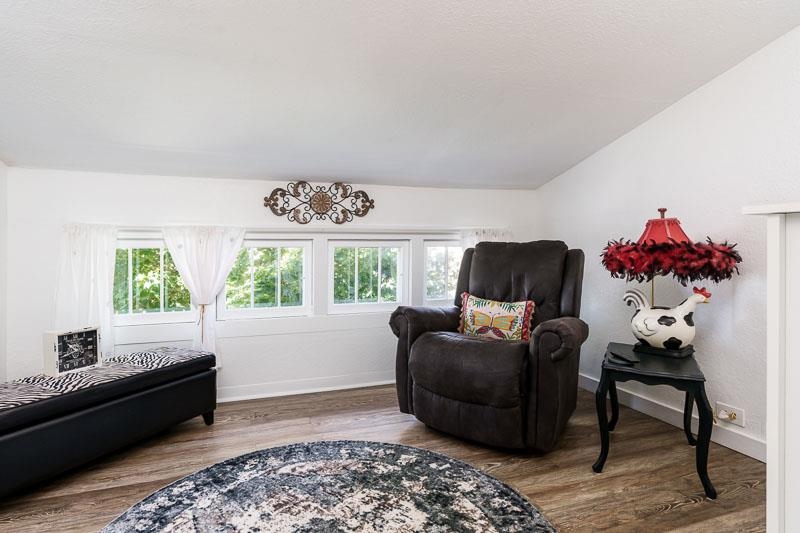 620 Harlem Road Machesney Park, IL 61115 - Photo 26 of 42 a living room with furniture and a window