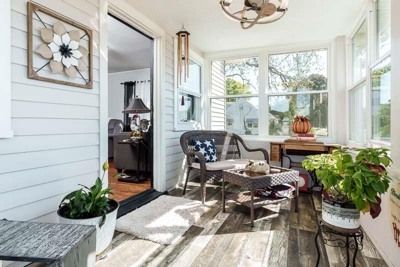 620 Harlem Road Machesney Park, IL 61115 - Photo 31 of 42 a workspace with furniture and a potted plant