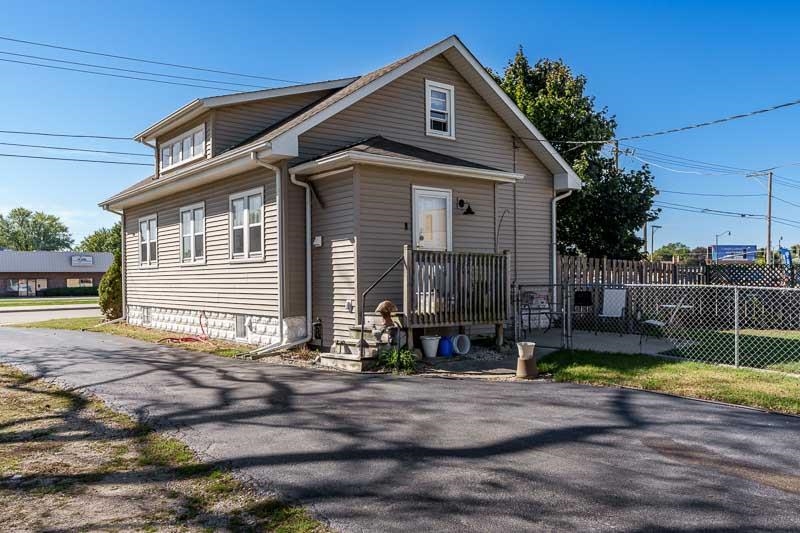 620 Harlem Road Machesney Park, IL 61115 - Photo 42 of 42 a view of a house with a yard and sitting area