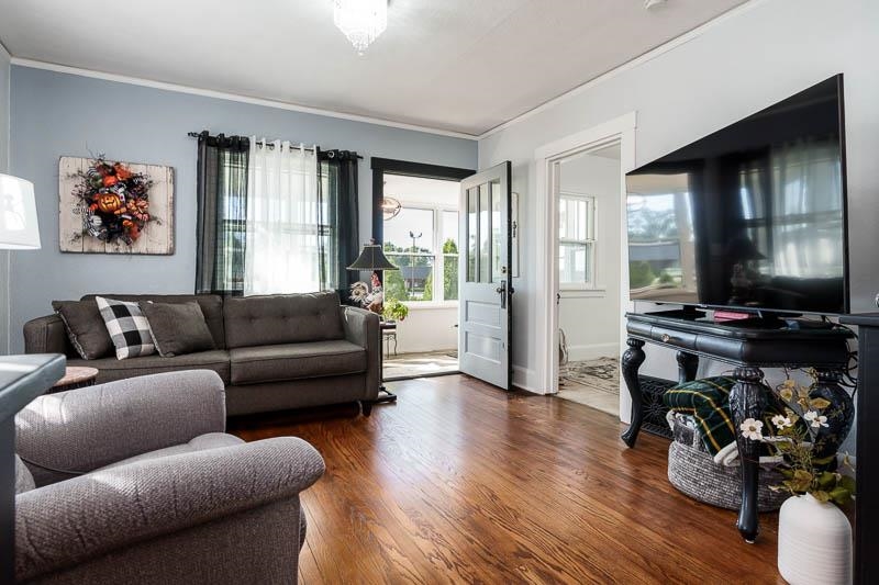 620 Harlem Road Machesney Park, IL 61115 - Photo 5 of 42 a living room with furniture and a flat screen tv