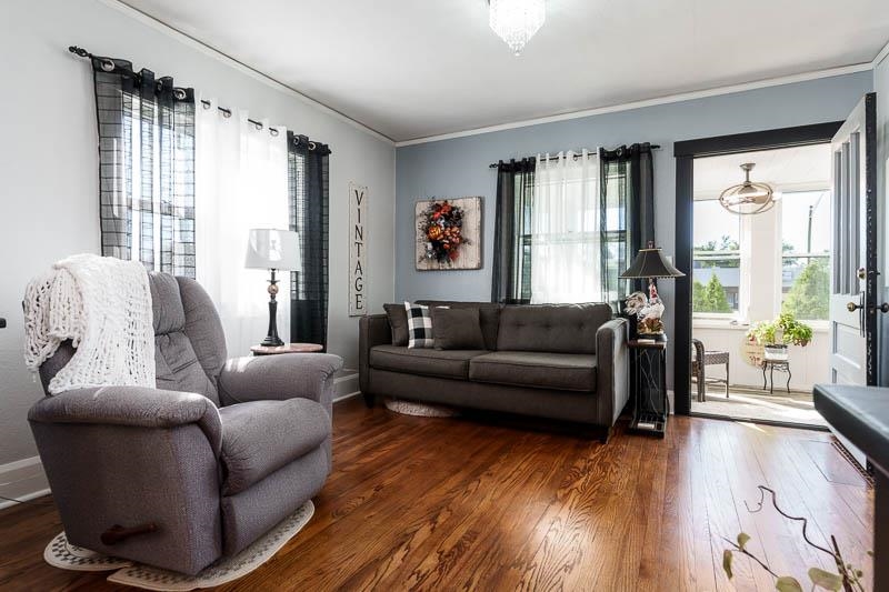 620 Harlem Road Machesney Park, IL 61115 - Photo 6 of 42 a living room with furniture and a large window