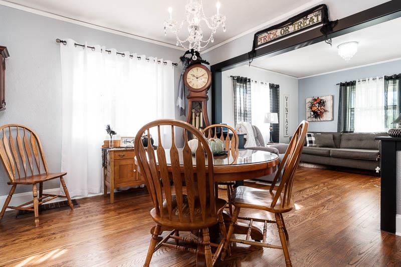 620 Harlem Road Machesney Park, IL 61115 - Photo 8 of 42 a view of a dining room with furniture window and wooden floor