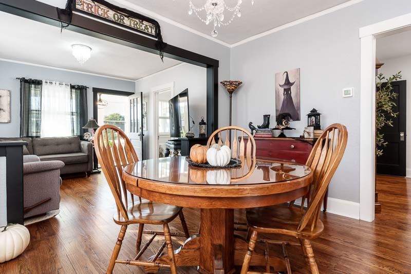 620 Harlem Road Machesney Park, IL 61115 - Photo 9 of 42 a view of a dining room with furniture window and wooden floor