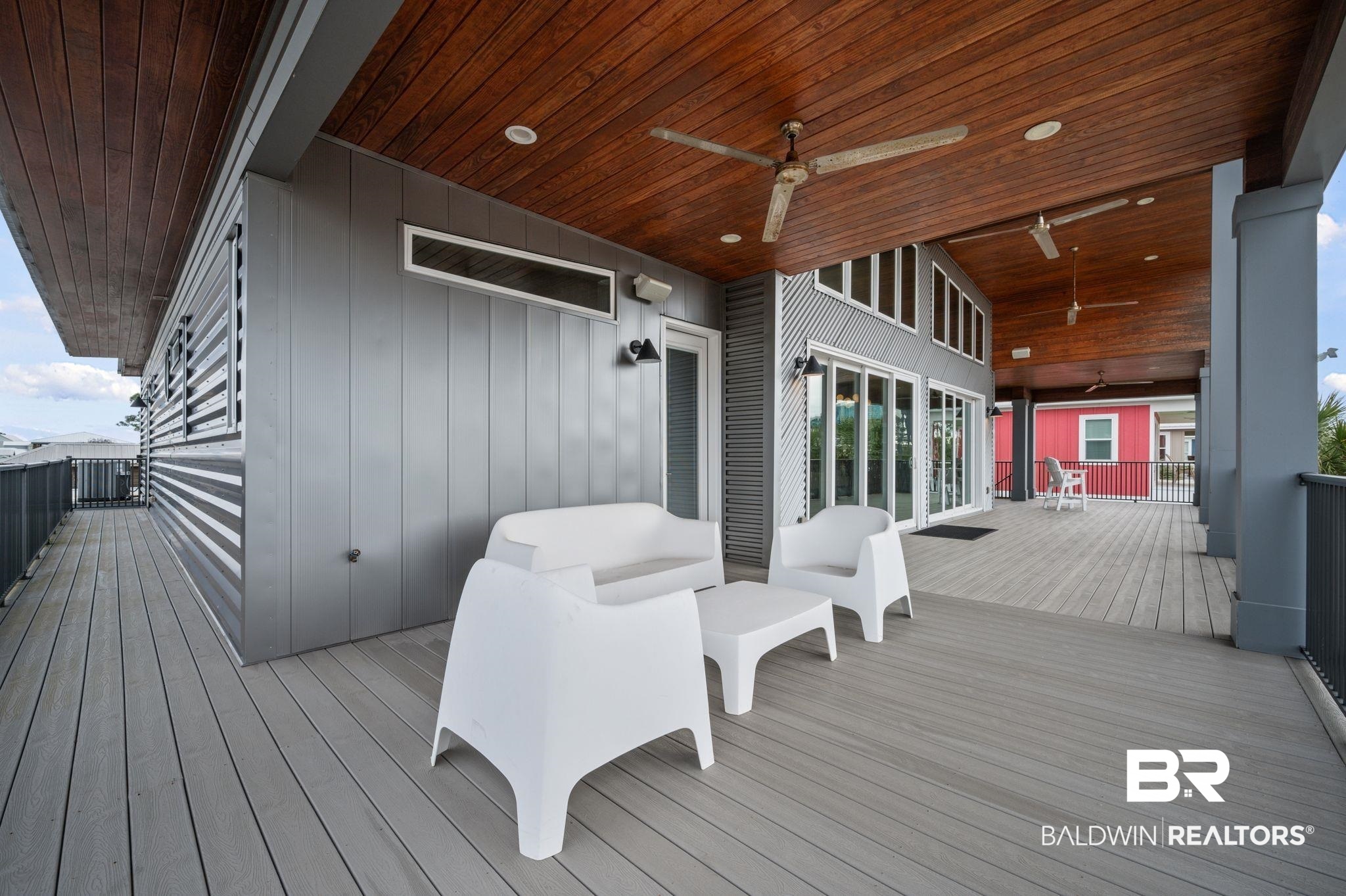 3840 Cotton Way Orange Beach, AL 36561 - Photo 39 of 75 Wooden terrace with ceiling fan