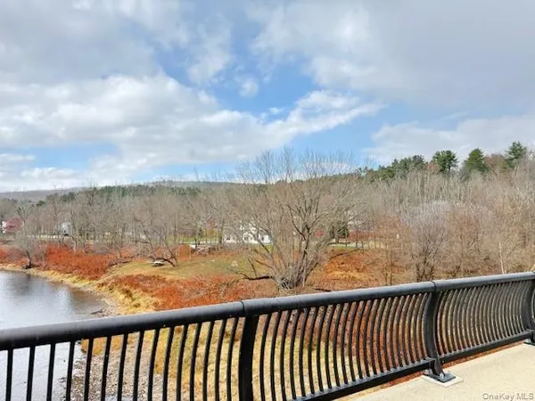 a view of a balcony with lake view