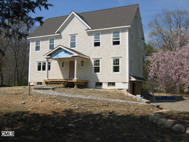 12 Buckthorn Road Norwalk, CT 06851 - Photo 1 of 1 a front view of a house with a yard