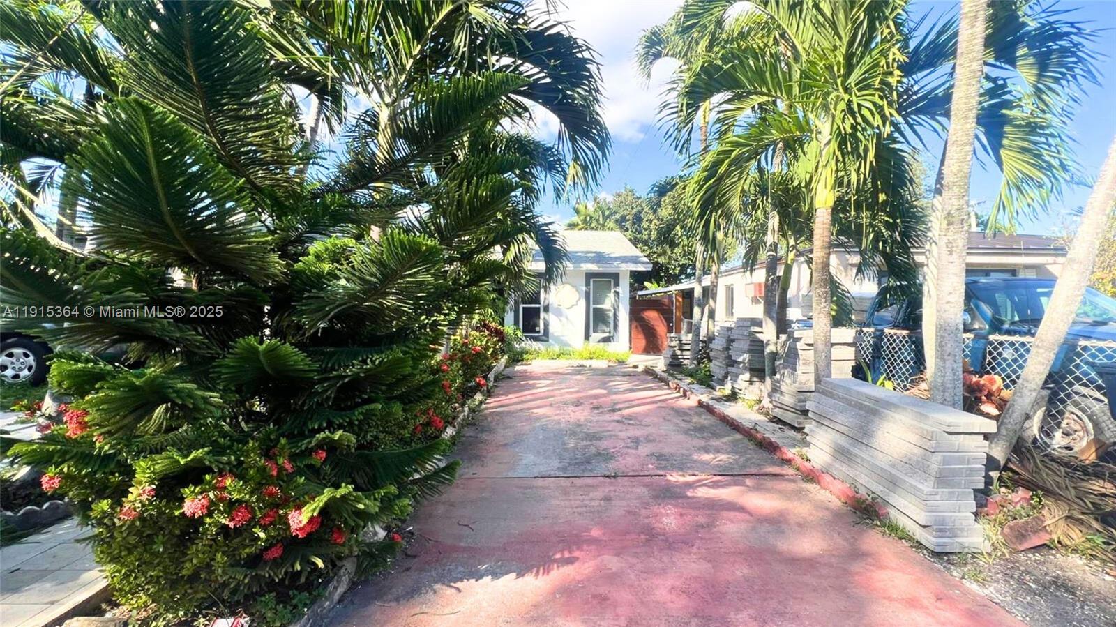 a view of a pathway with a house