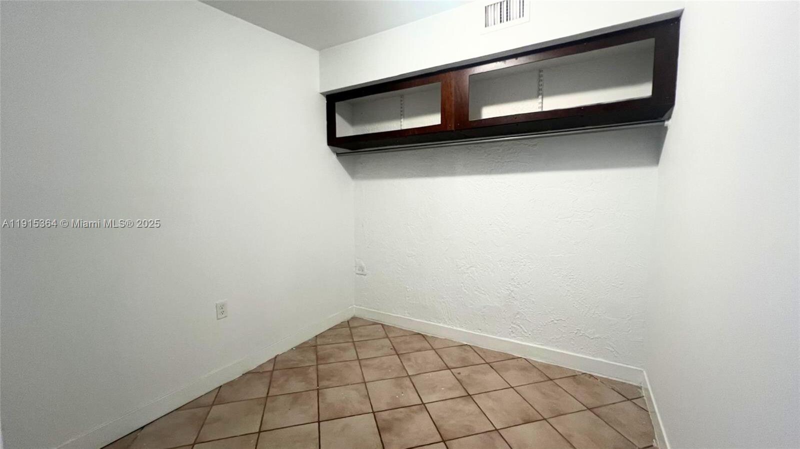 6481 Southwest 39th Terrace, Unit 2 Miami, FL 33155 - Photo 5 of 7 a view of a small space