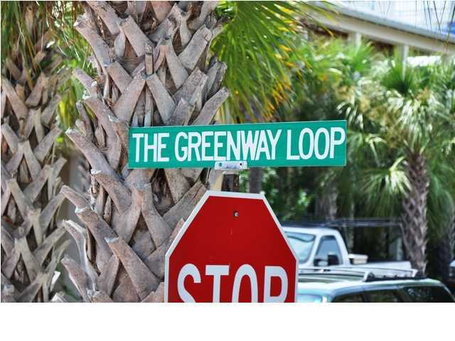 W5 Greenway Loop Seacrest, FL 32461 - Photo 14 of 14 a view of outdoor space with signage and flags