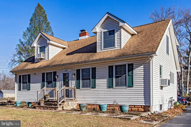a front view of a house with a garage