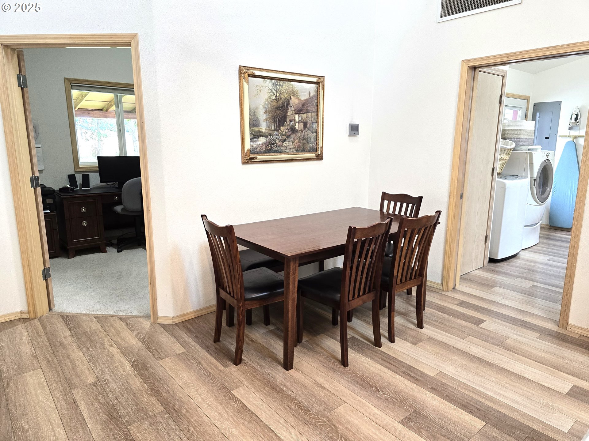 80393 Zimmer Lane Hermiston, OR 97838 - Photo 12 of 46 a view of a dining room with furniture and wooden floor