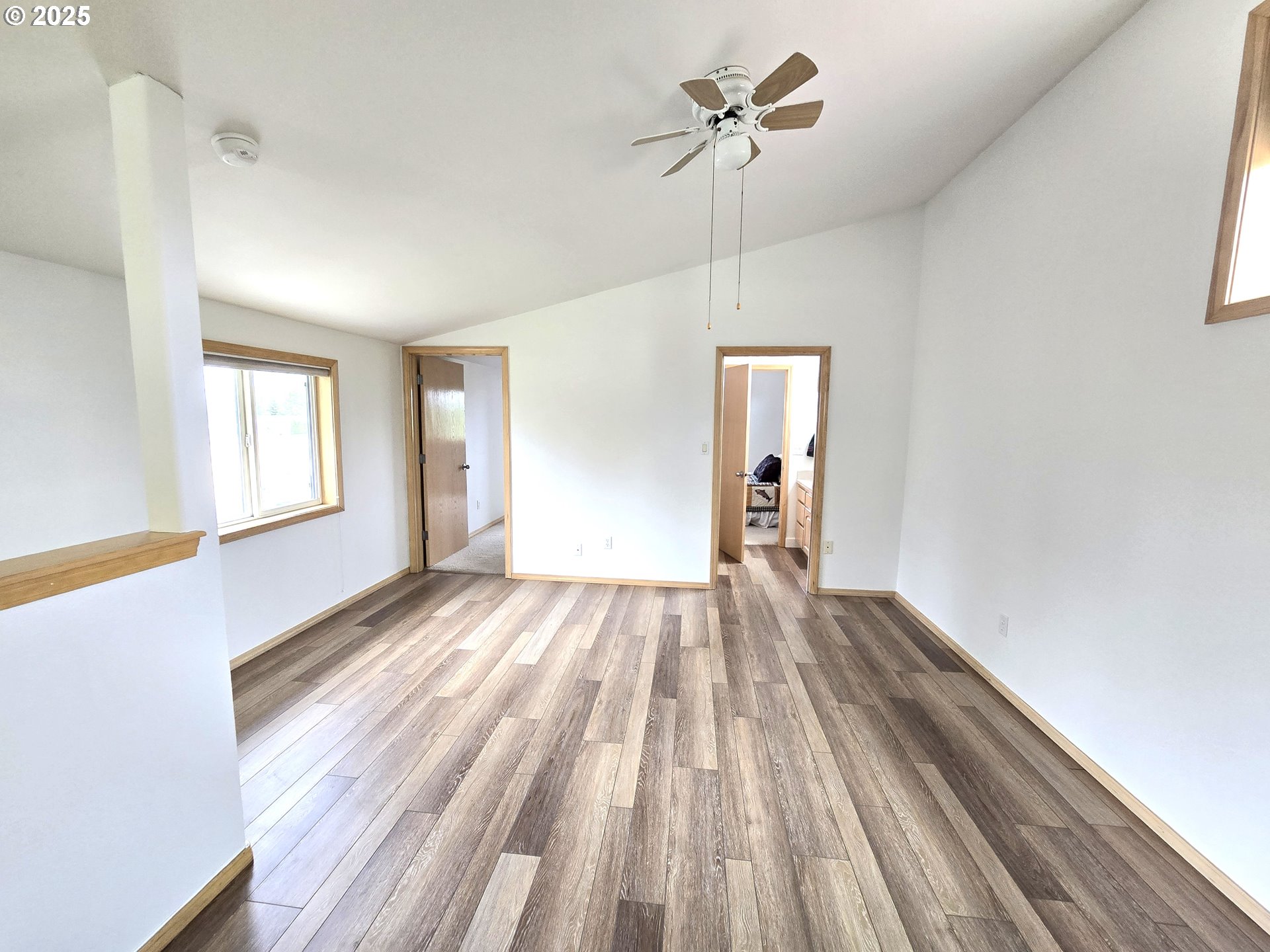 80393 Zimmer Lane Hermiston, OR 97838 - Photo 25 of 46 a view of empty room with wooden floor and fan