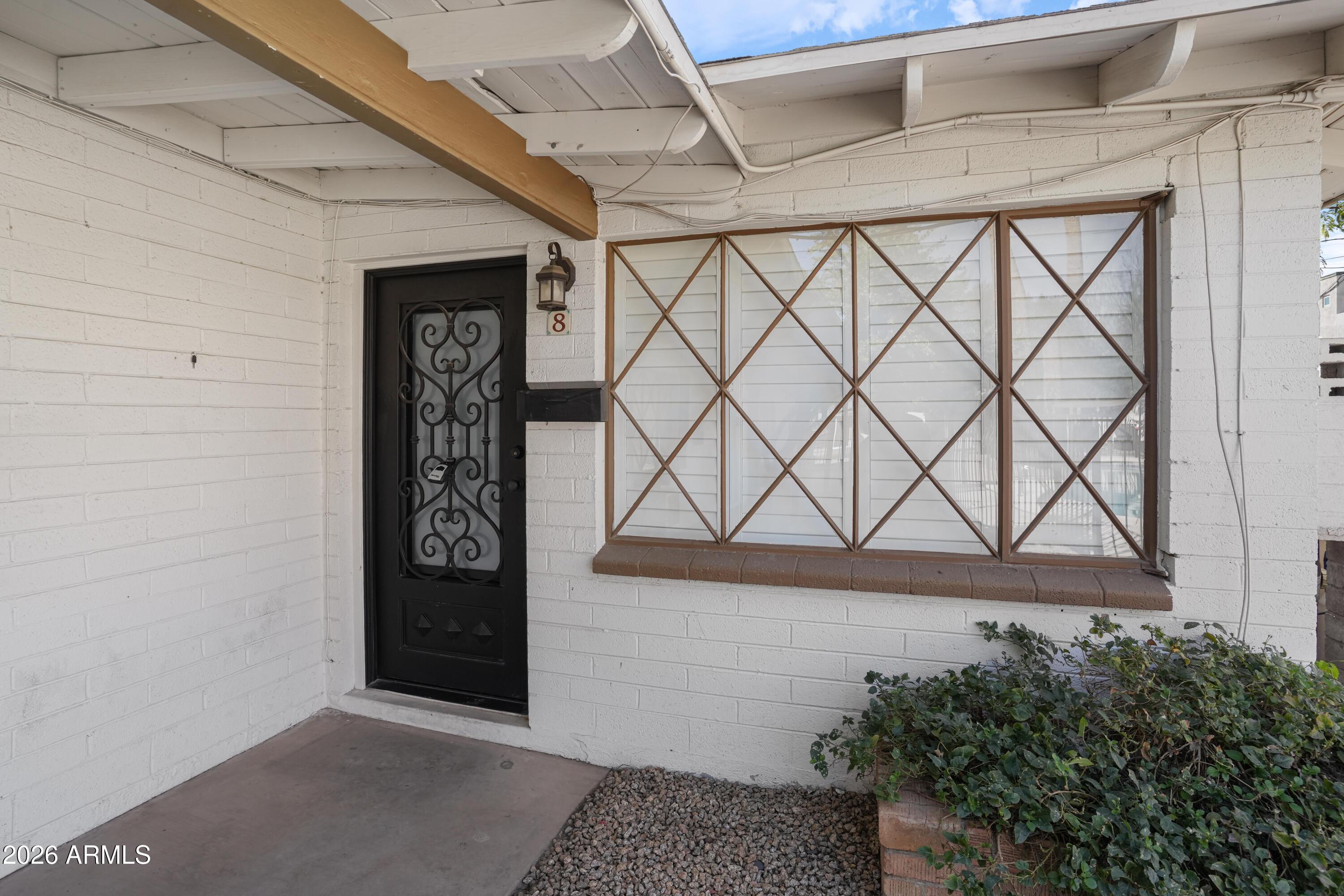 a view of a door and an entryway