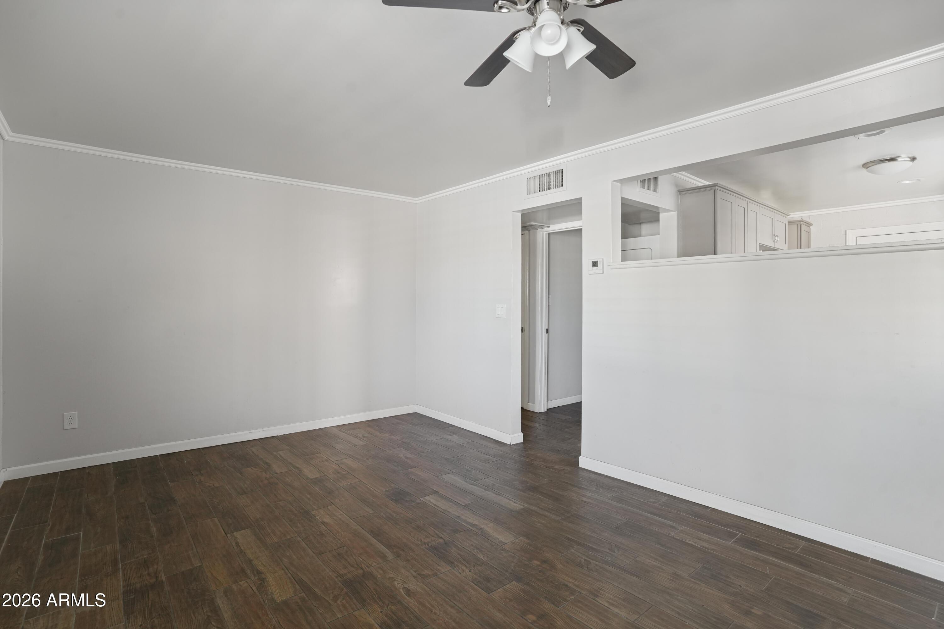 3426 North Miller Road, Unit 8 Scottsdale, AZ 85251 - Photo 5 of 10 a view of an empty room with a window