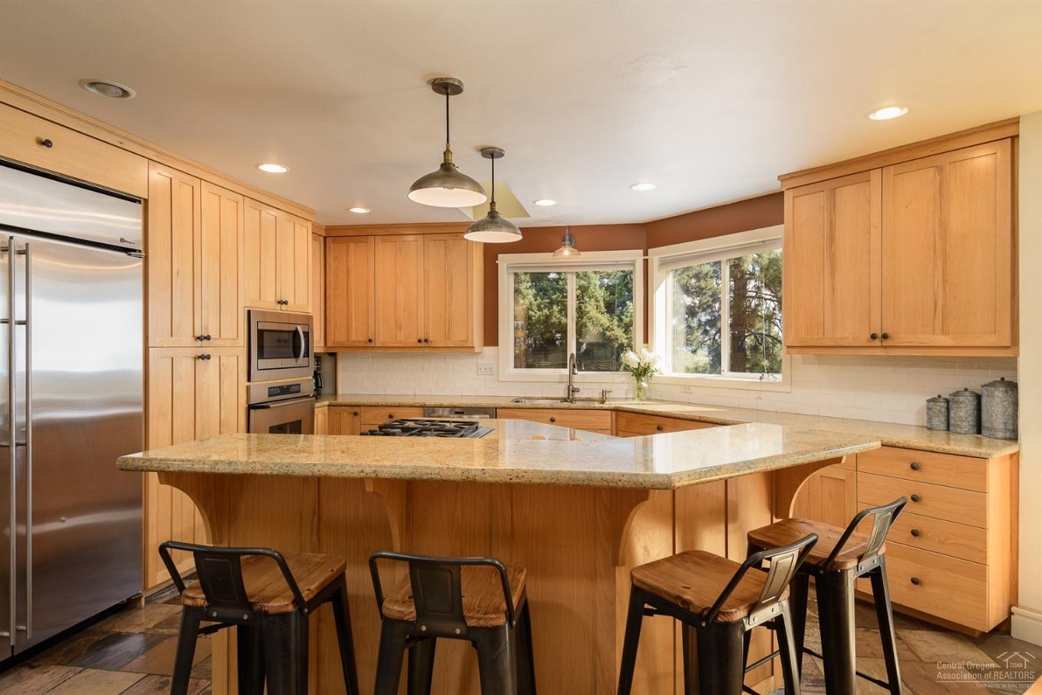 3802 Northwest Summerfield Road Bend, OR 97703 - Photo 7 of 25 Large island for provides lots of extra