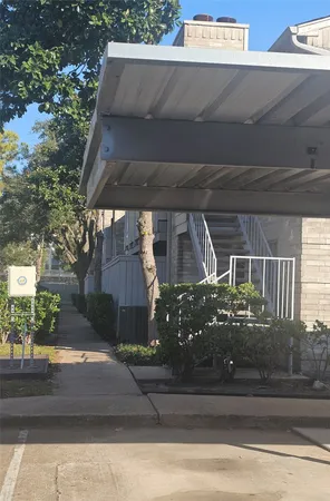 a view of house with garage