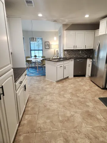 a very nice looking room with a large window