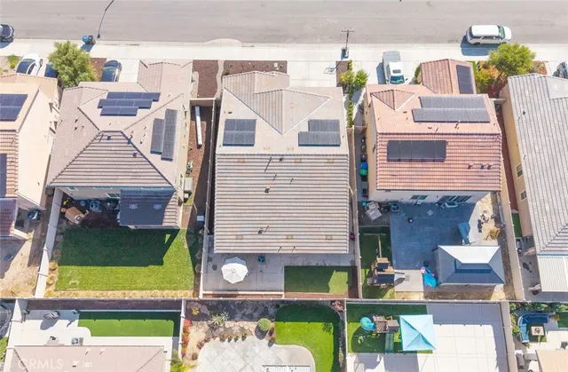 an aerial view of residential building and ocean