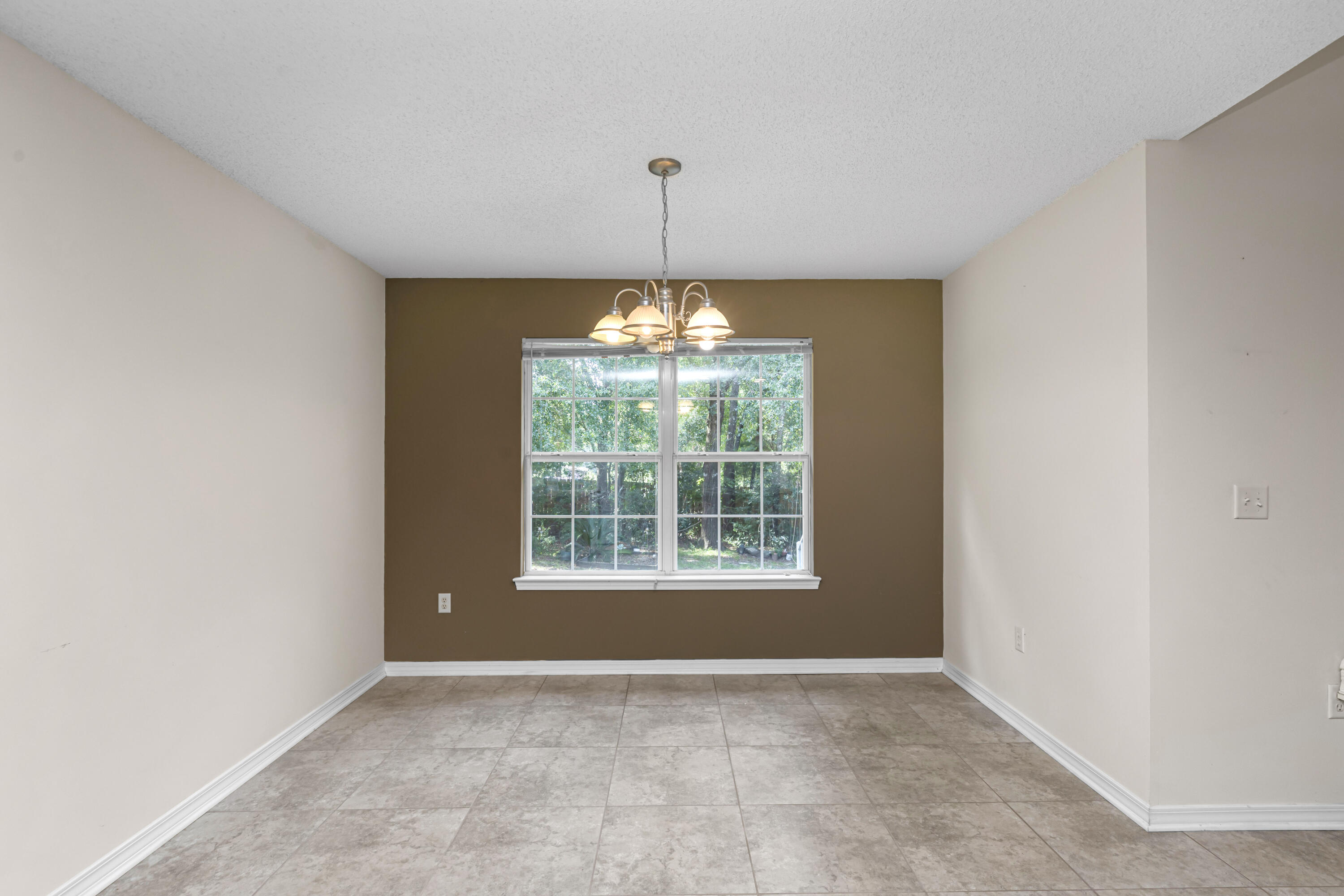 2864 Soles Lane Crestview, FL 32539 - Photo 21 of 32 a view of an empty room with a window