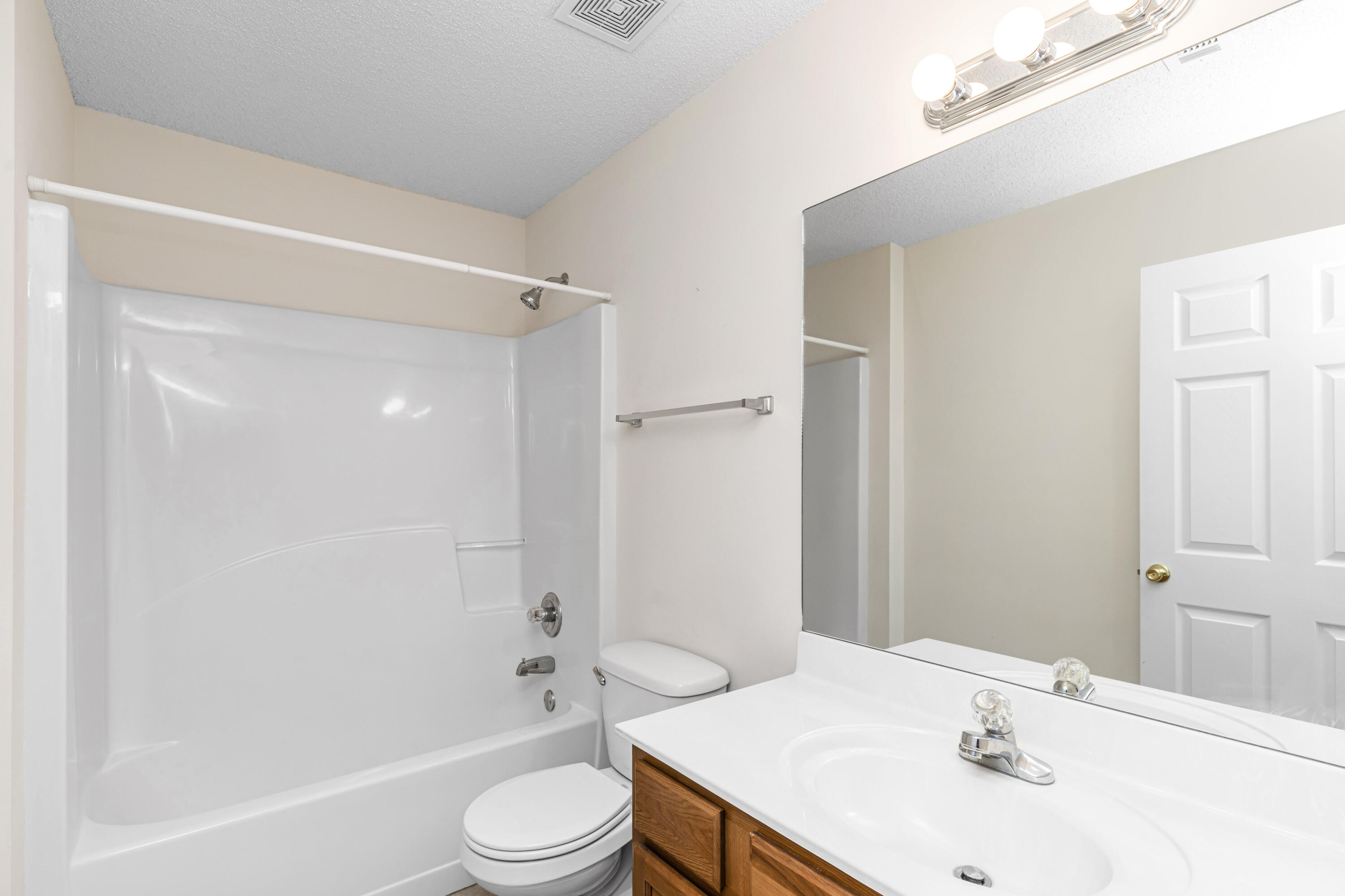 2864 Soles Lane Crestview, FL 32539 - Photo 27 of 32 a bathroom with a sink toilet and shower