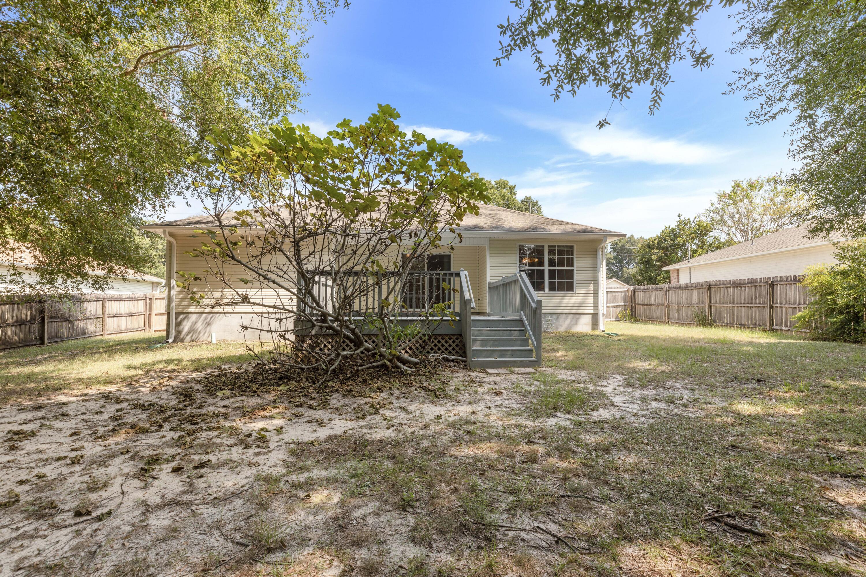 2864 Soles Lane Crestview, FL 32539 - Photo 6 of 32 a view of a house with a yard